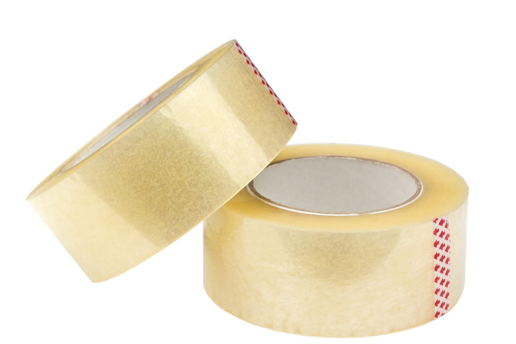 Two rolls of adhesive tape. Isolated on white background. Clipping path is saved.